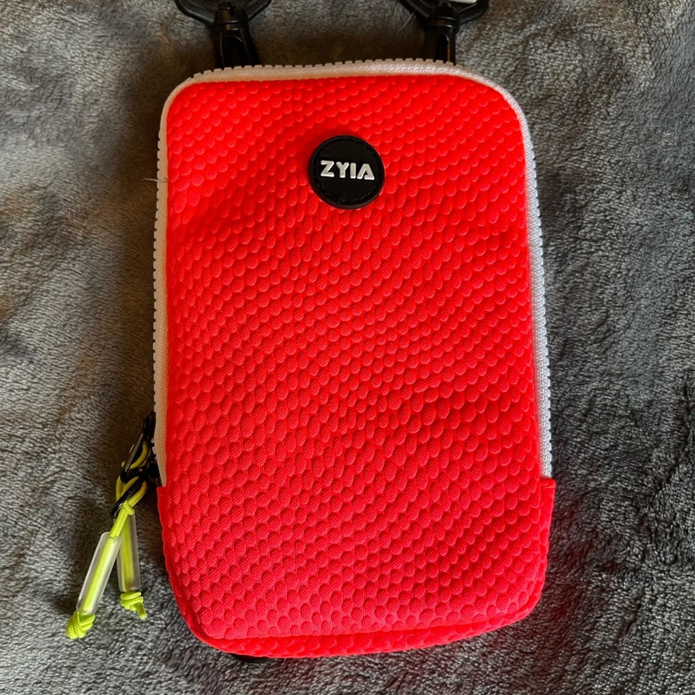New Without tags Zyia Active crossbody. Neon Pink Orange Neon Green White color.